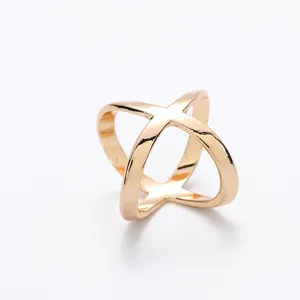 Gold plated cross hollow silk scarf buckle detail shot, elegant clothing accessory design.