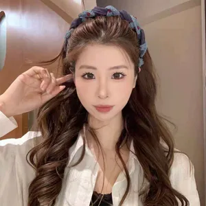 Cerchietto intrecciato in tessuto in stile coreano con pettine a denti per donne chic.