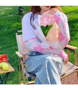 Manches de protection solaire pour femmes à motif floral rose, anti-UV pour activités en plein air.