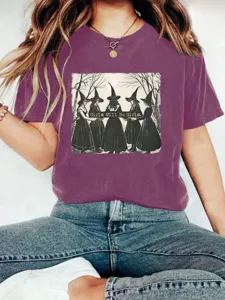 Vintage witch graphic short sleeve t-shirt for women, casual summer crewneck top.