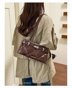 Detail view of the Korean style soft patent leather quilted shoulder bag with chic lock closure.