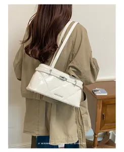 Chic quilted patent leather shoulder bag with metal lock, retro commuter underarm bag.