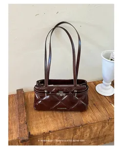 Retro brown soft leather quilted shoulder bag with metal lock for women commuter.
