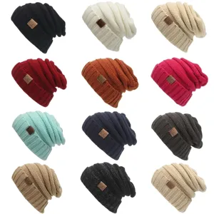 Multiple colors winter warm knit slouchy beanie hats detail view, soft cozy fabric for cold days.