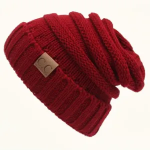 Red winter knitted slouchy beanie hat for women and men, warm thermal rolled-edge cap.
