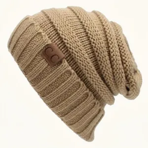 Winter warm knitted slouchy beanie hat for men and women with stylish leather label.