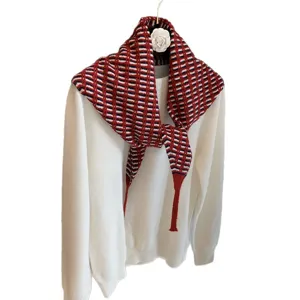 Retro knitted triangle shawl scarf, vintage autumn winter cozy fashion accessory.