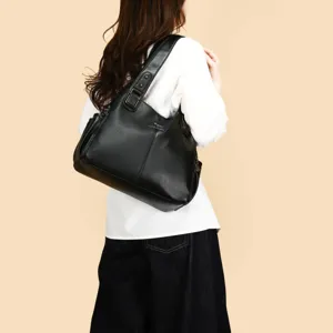 Klassieke zwarte dames forens tote tas, grote capaciteit schoudertas stijlvol design.