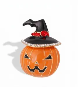 Halloween pumpkin witch hat brooch pin with red rhinestones and alloy material for festive wear.