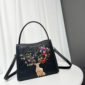 Chic black crossbody bag with exquisite floral deer embroidery, versatile daily commuting style.