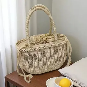 Minimalistische geweven strooien handtas voor dames, hippe strandtas met trekkoord.