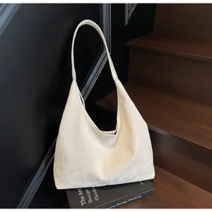 Sac à épaule hobo minimaliste chic pour femme, grand cabas de travail rétro et élégant.