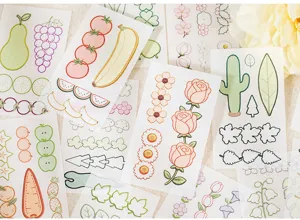 Encantadoras hojas de pegatinas botánicas y de frutas bordadas, ideales para manualidades DIY.