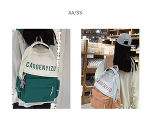 Vista dettagliata dello zaino in tela grande capacita con design bicolore e tasche laterali.