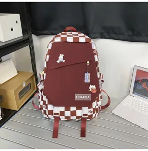 Zaino a quadri casual per studentesse, grande borsa scolastica con simpatici badge.