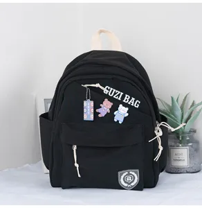 Black mini casual backpack for women, lightweight Japanese style daily schoolbag.