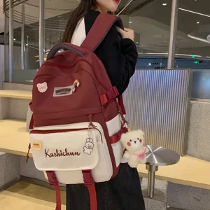 Damen Casual Nylon Rucksack Großes Fassungsvermögen Schultasche Farbblock Studenten Büchertasche Mit Abzeichen Und Anhängern