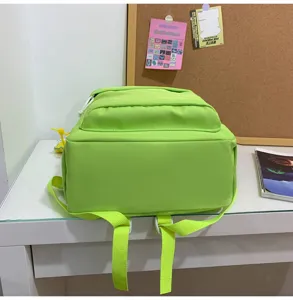 Lime green canvas backpack for women, casual school bookbag, large capacity daypack detail view.