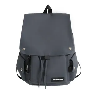 Modischer Unisex Rucksack aus grauem Leder mit Kordelzug und praktischen Taschen.