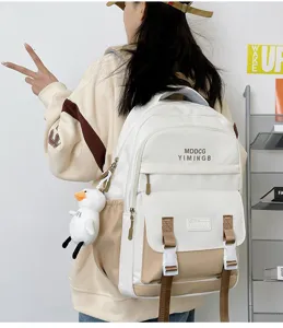 Zaino casual per studenti con ciondolo anatra, grande capacità borsa scolastica bianco e cachi.