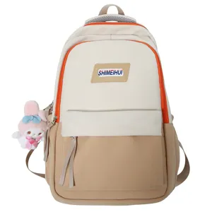 Zaino casual in tela per donne e studenti, grande borsa scolastica con un grazioso ciondolo.