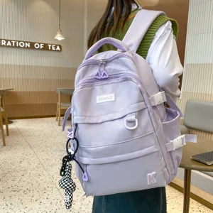 Mochila escolar de gran capacidad para mujer, elegante mochila casual morada con lindo colgante.
