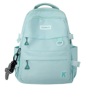 Mochila escolar casual azul claro para estudiantes, gran capacidad con bolsillos múltiples.