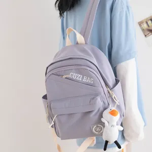 Lightweight small backpack for women, cute Japanese style casual daypack with duck pendant.