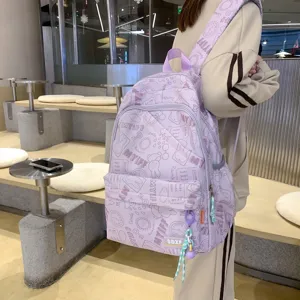 Cute purple backpack for women students, large capacity casual school bag with cartoon print.
