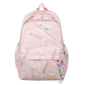 Pink cute backpack for teen girls, large capacity casual school bookbag with playful prints.