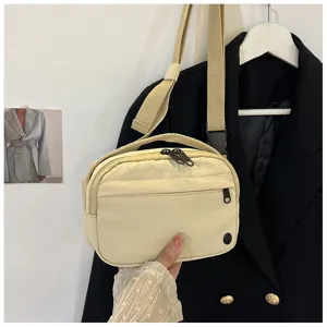 Casual nylon crossbody phone bag, waterproof lightweight canvas square bag detail view.