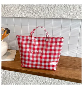 Red and white checkered tote bag detail shot, large capacity canvas bag for daily use.