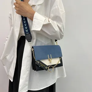 Trendy colorblock women shoulder bag with wide strap and chain detail, casual chic crossbody.