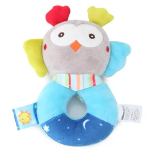 Plush owl baby rattle toy detail showcasing soft fabric, colorful wings and safe grasping ring.