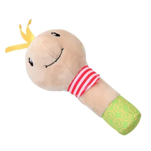 Plush baby rattle toy detail, soft stuffed animal stick with colorful ribbon and chime.