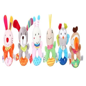 Plush animal hand rattle toy detail view, soft fabric and colorful design for baby grip training.