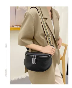 Black genuine leather saddle bag for women, casual crossbody shoulder bag with wide strap.