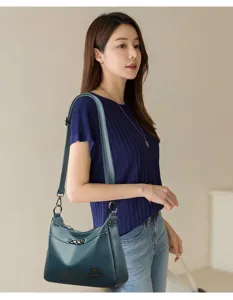 Stylische Damen PU Leder Schulter Umhängetasche mit eleganten Kettendetails und Riemen.
