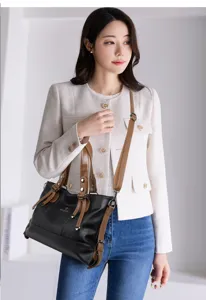 Stylish large capacity soft leather shoulder bag for women, commuter tote with dual handles.