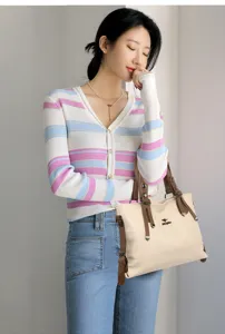 Chic large capacity soft leather tote bag for women, stylish striped cardigan match outfit.