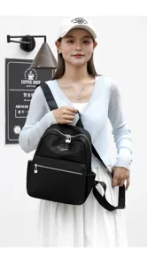 Sac à dos en nylon noir pour femme sac de voyage décontracté grande capacité tendance