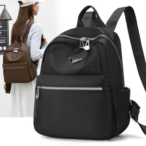 Sac à dos en nylon pour femme sac de voyage décontracté grande capacité noir élégant.