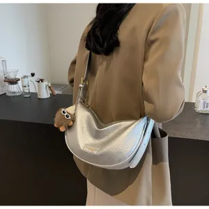 Stijlvolle zilveren hobo schoudertas voor dames, premium kunstleer maan design met leuke hanger.