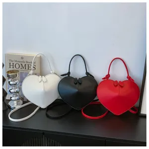 Borsa a tracolla donna moda forma di cuore stile dolce superficie lucida dettagli