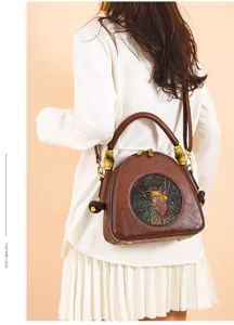 Retro gepaarte Hirsch Leder Umhängetasche mit Bambus Griff Design für stilvolle Damen.