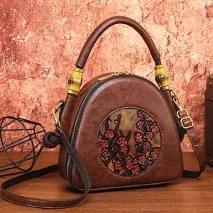 Vintage gepraegte Pflaumenbluete Umhaengetasche, retro ethnische Damen Schultertasche.