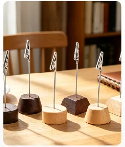 Wooden memo photo clip holder with metal alligator clip and solid wood base for desktop decor.