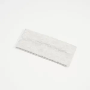 Dettaglio fascia elastica larga grigia melange, tessuto in maglia comodo yoga.