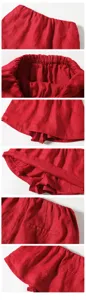 Detailansicht der roten Leinenshorts mit elastischem Bund und Anti-Rutsch-Innenfutter-Design.