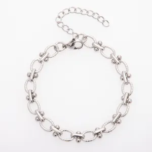 Stainless steel dumbbell link bracelet detail view, textured oval metal design with clasp.